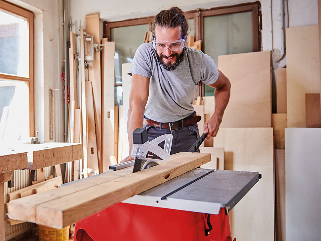 man working with a table saw