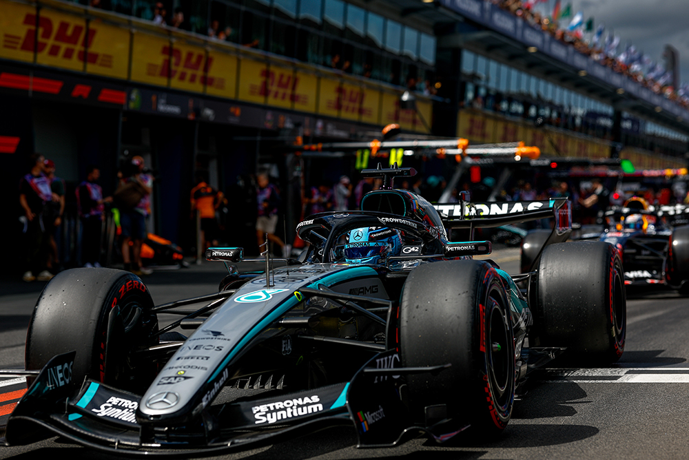Formula 1 race car in the pit lane during a race weekend.