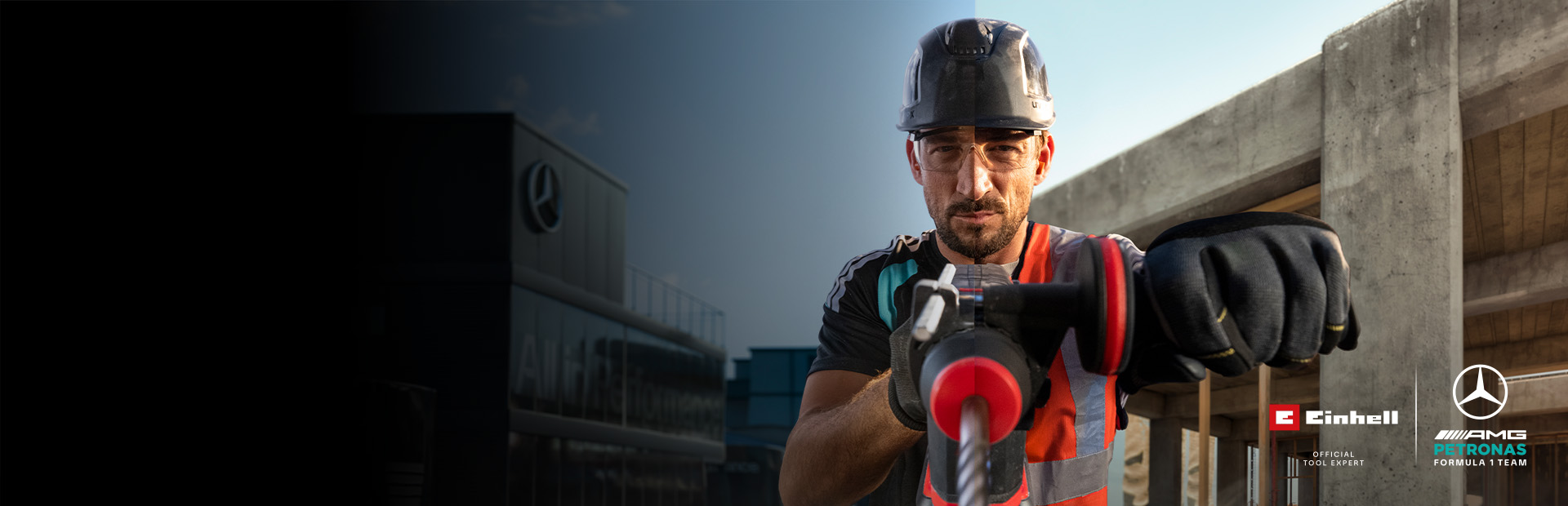 Un mecánico con equipo de protección que está taladrando con una herramienta eléctrica en una obra.